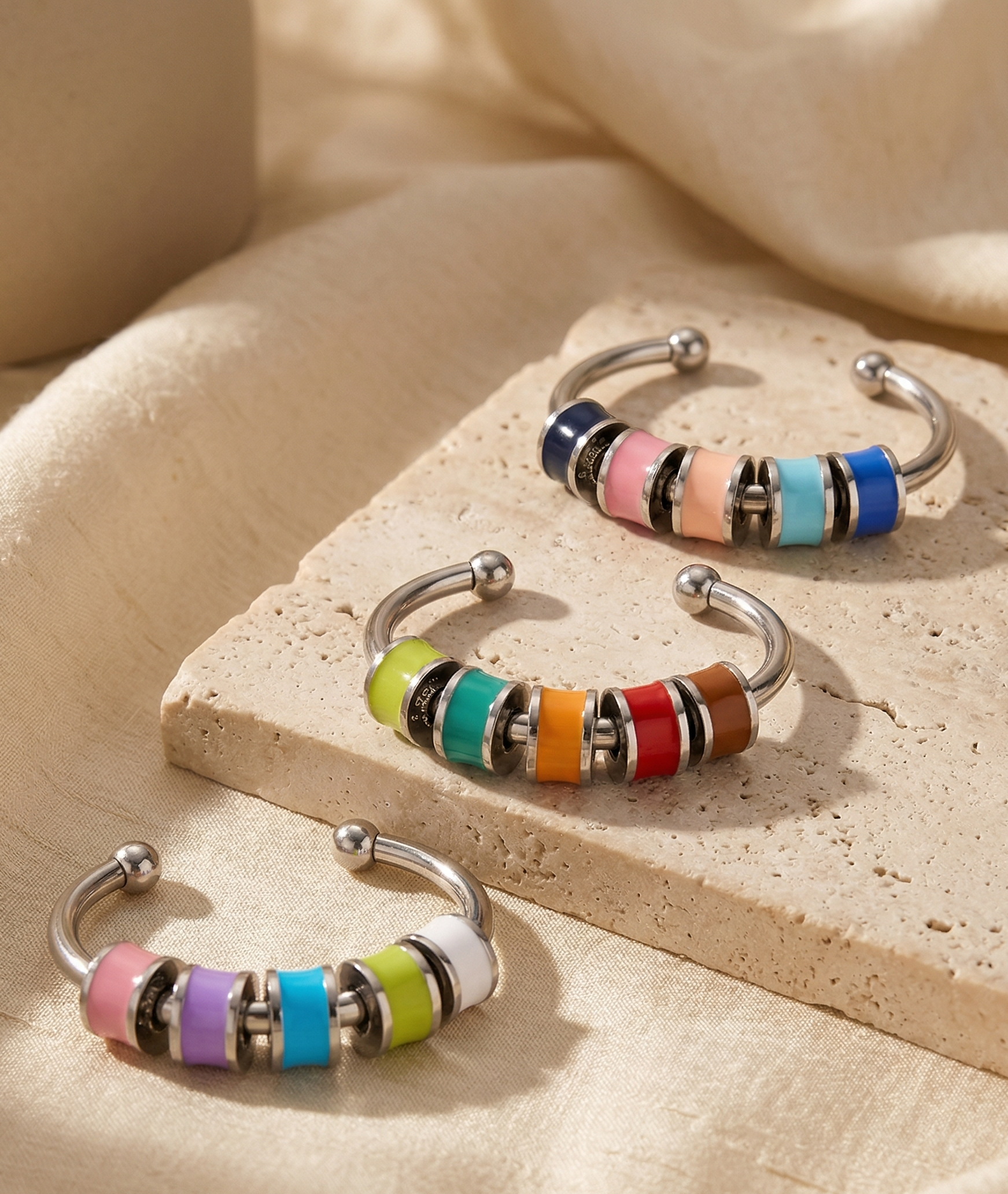 3 rings with colorful enamel beads
